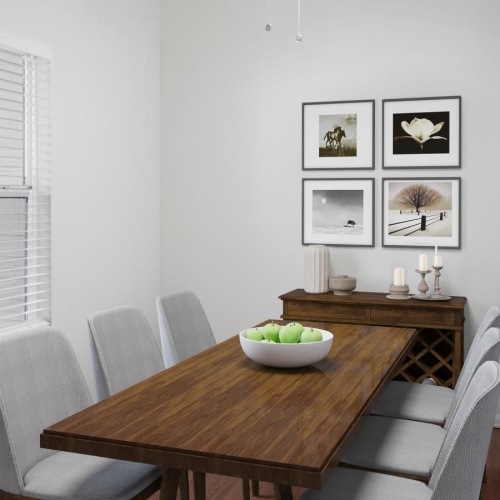 Settle into comfort at Columbia Trails a dining table with a bowl of fruit on it