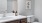 a bathroom with a sink toilet and mirror
