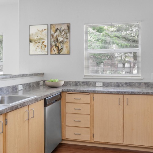 Elegance everywhere you look a kitchen with a sink and cabinets