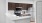 a kitchen with wooden cabinets