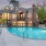 a swimming pool in front of a house